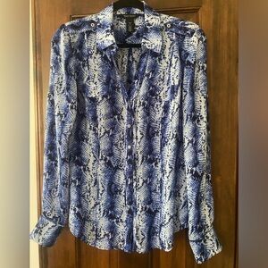 White House Black Market blue snake print silk blouse.